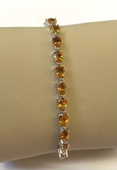 Bracelet en argent 925/oo orné de citrines...