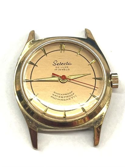 SELECTA
Montre en acier doré à boitier rond,...
