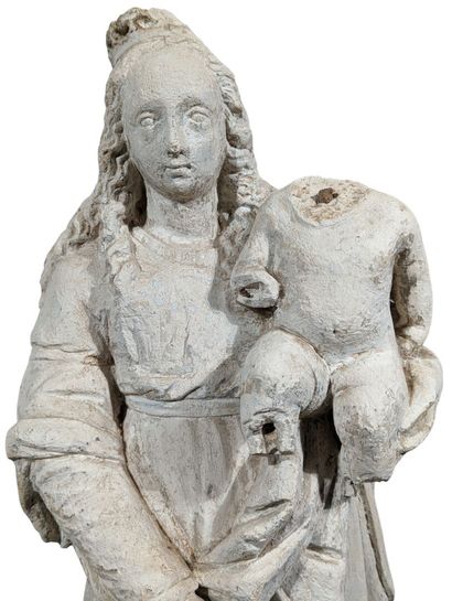 VIERGE A L'ENFANT en pierre calcaire sculptée....