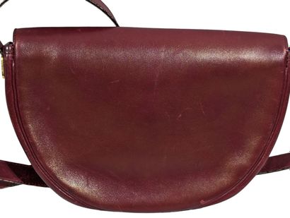 CHRISTIAN DIOR
Petit sac bandoulière de forme...