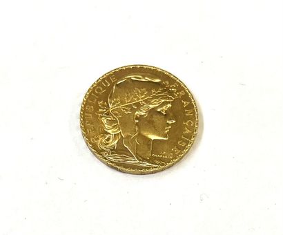 Une pièce de 20 FRANCS 1907 au cop de chaplain...