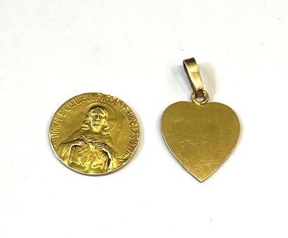 MEDAILLE DE BAPTEME en or rose figurant Saint-Joseph...