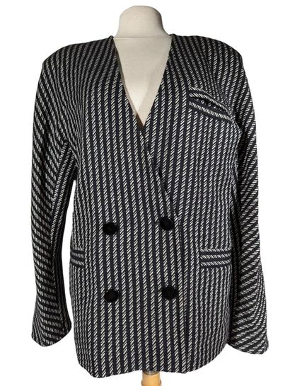 PIERRE BALMAIN
Veste en laine à décor noir...