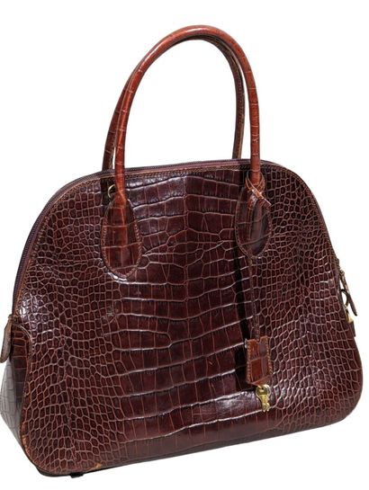 LANCEL Paris
Sac à main en cuir marron imitation...