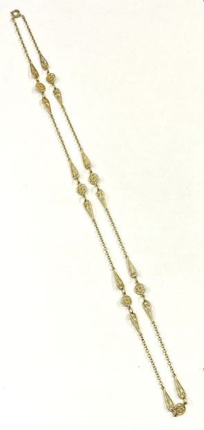 Sautoir en or jaune 18 K (750/oo) à mailles...