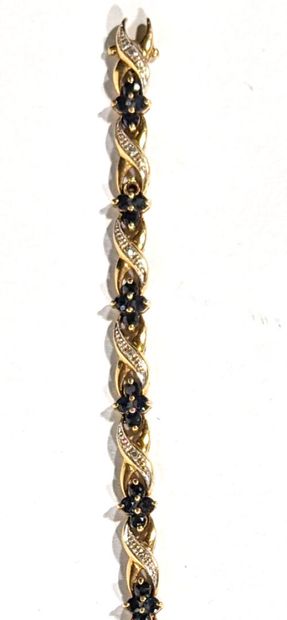 BRACELET en or jaune 750‰ sertie de diamants...