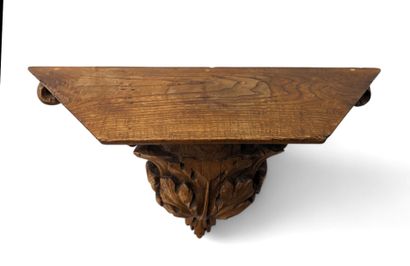 CONSOLE D'APPLIQUE en chêne sculpté d'un...