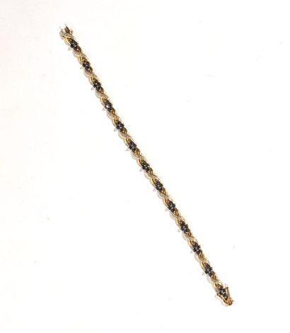 BRACELET en or jaune 750‰ sertie de diamants...