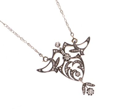 COLLIER en argent 800‰ à fond en or rose...