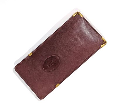 CARTIER
Étui à lunette en cuir lisse bordeaux.
(petites...