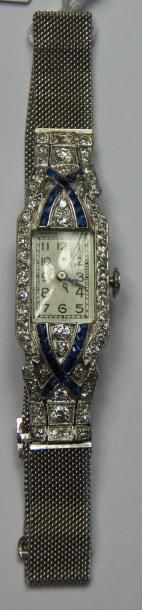 Montre de dame en platine, cadran rectangulaire,...