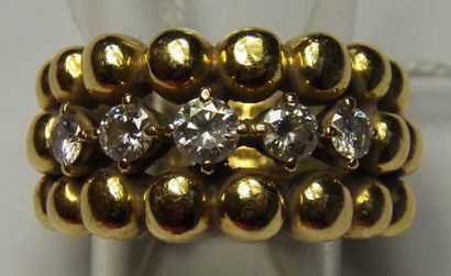 BOUCHERON
Anneau en or jaune à motif de boules...