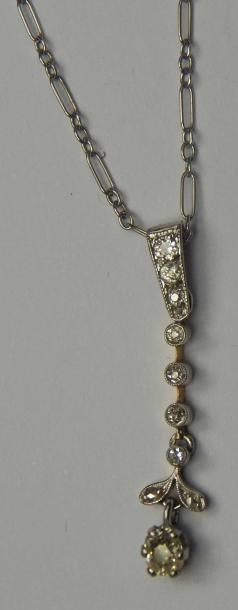 Pendentif en or gris serti d'un diamant taille...