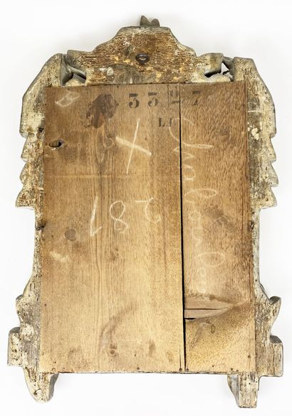 MIROIR en bois et stuc dorés à décor d'un...