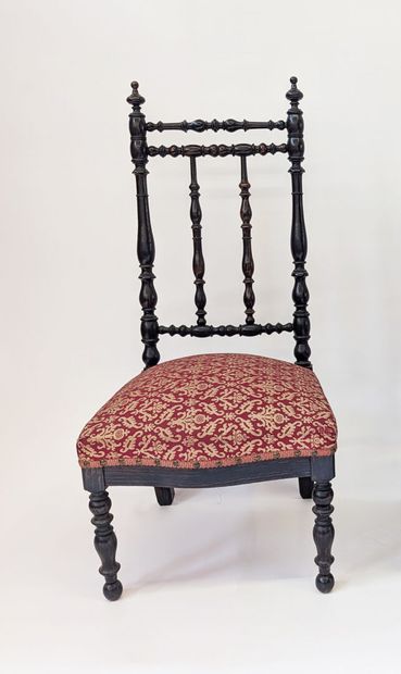 CHAISE en bois tourné et noirci.
Époque Napoléon...