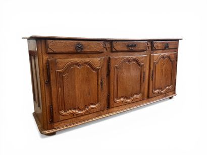 BUFFET ENFILADE en chêne mouluré ouvrant...