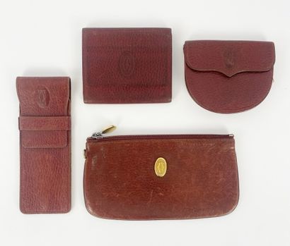 Must de CARTIER
Burgundy leather set including...