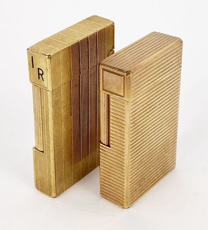 ST DUPONT
Two gold-plated metal lighters...