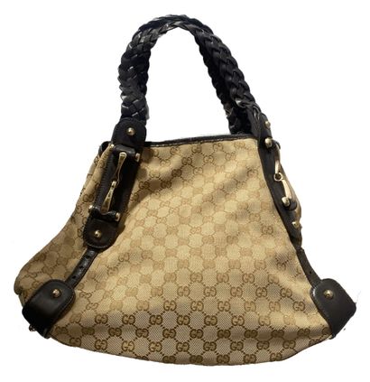 GUCCI
Beige GG Supreme canvas bag with brown...