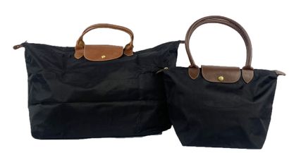 LONGCHAMP
Set of fabric leather goods, including...
