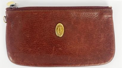 Must de CARTIER
Burgundy leather set including...