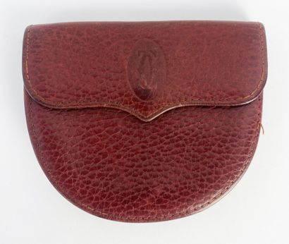 Must de CARTIER
Burgundy leather set including...