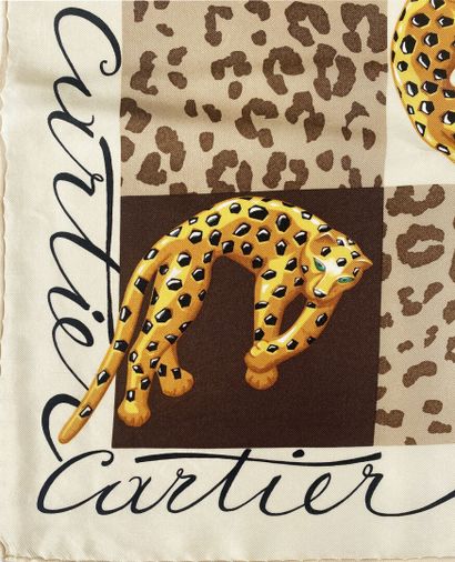 CARTIER
Silk square with panther motif.
65...