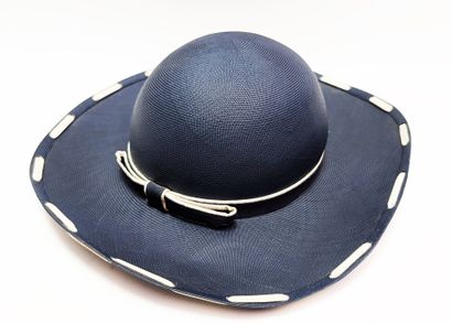 CHANEL
Women's navy blue woven straw hat...