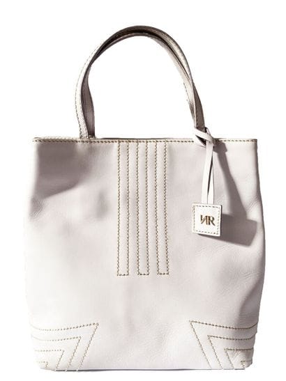 NINA RICCI
Small white-gray handbag with...