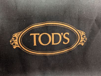 TOD'S
Set of two pairs of shoes: red loafers...