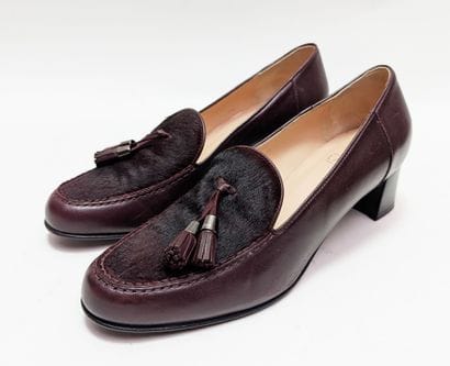 LARIO
Pair of burgundy leather and fur heels...