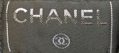 CHANEL
Black and pink tweed skirt, high-waisted,...