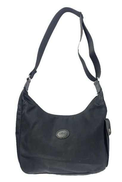 LONGCHAMP
Set of fabric leather goods, including...