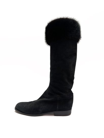 CHANEL
Pair of black suede boots with mink-trimmed...