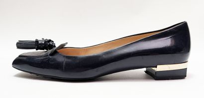 TOD'S
Set of two pairs of shoes: red loafers...