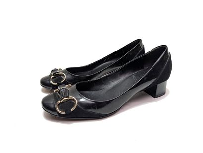 GUCCI
Pair of black patent leather and suede...
