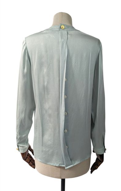 CHANEL - Boutique
Pastel blue silk blouse...
