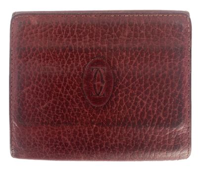 Must de CARTIER
Burgundy leather set including...