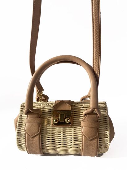 PAULE KA
Small crossbody bag in a wooden...