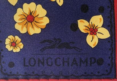 LONGCHAMP
Silk square featuring a pattern...
