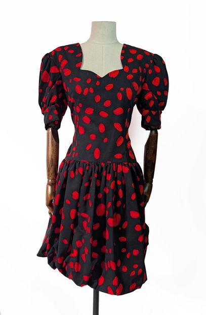 STARA 
Black cocktail dress with a red coffee...