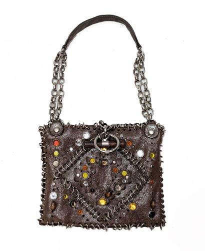 JAMIN PUECH
Small iridescent beige clutch...