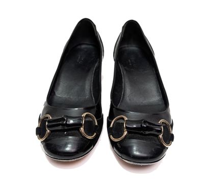 GUCCI
Pair of black patent leather and suede...