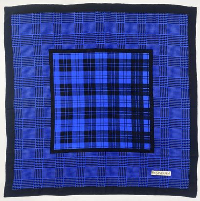 YVES SAINT LAURENT
Blue and black silk scarf.
Signed...