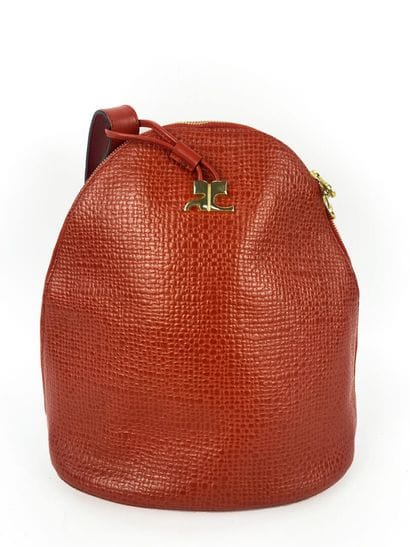 COURREGES
Red leather handbag, oval-shaped,...
