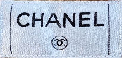 CHANEL
Beige tweed-style wool skater skirt,...