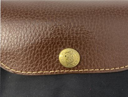 LONGCHAMP
Set of fabric leather goods, including...