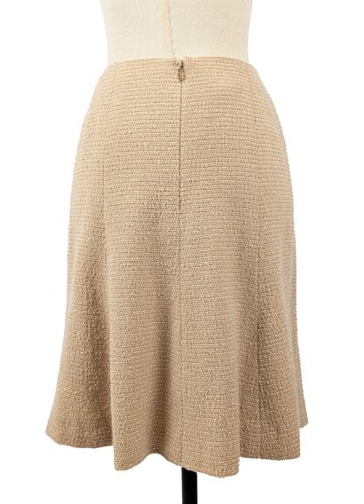 CHANEL
Beige tweed-style wool skater skirt,...