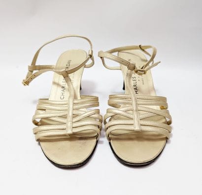 CHARLES JOURDAN
Pair of gold-colored leather...