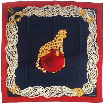 Must de CARTIER
Silk square with a jewelry-inspired...